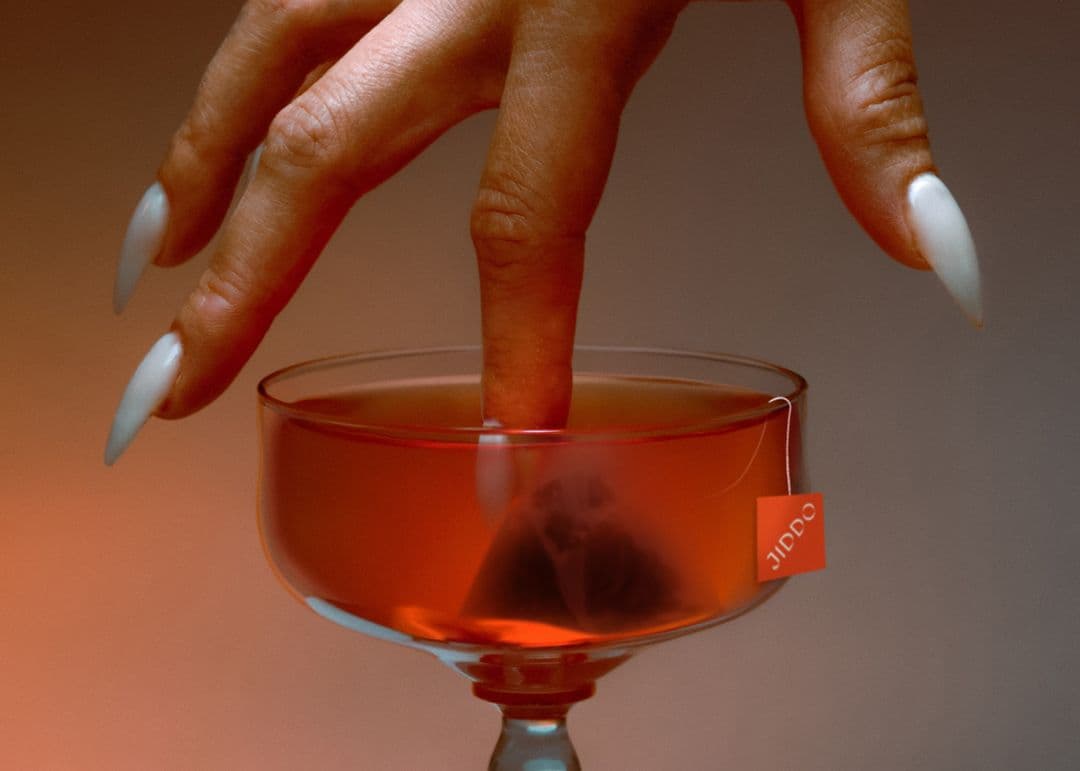 A JIDDO pyramid bag in a coupe glass